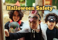 Halloween Safety. Three children in Halloween costumes.