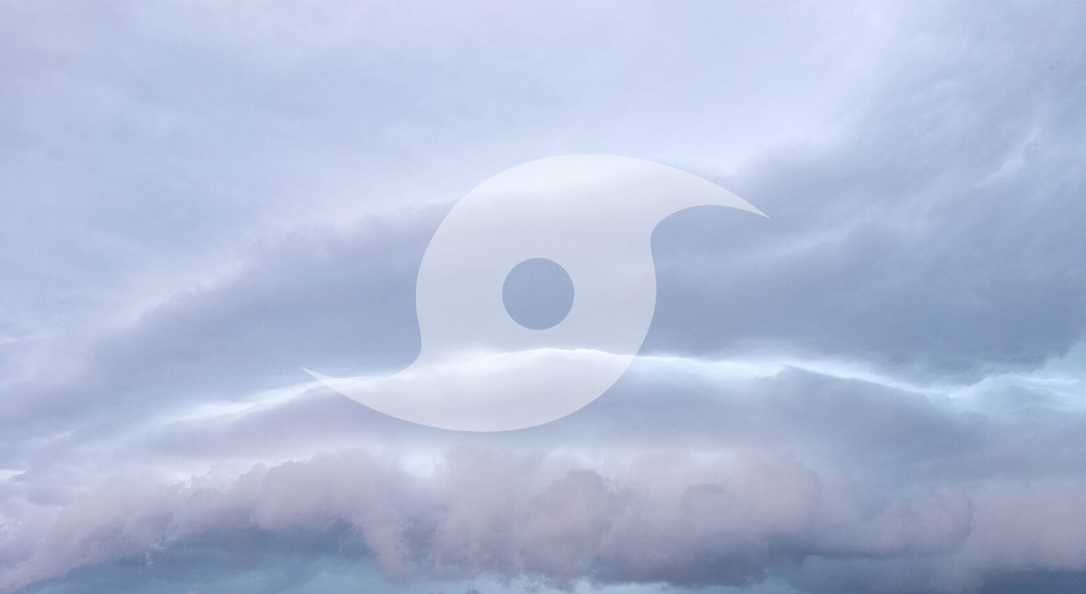 A hurricane symbol over a storm cloud.